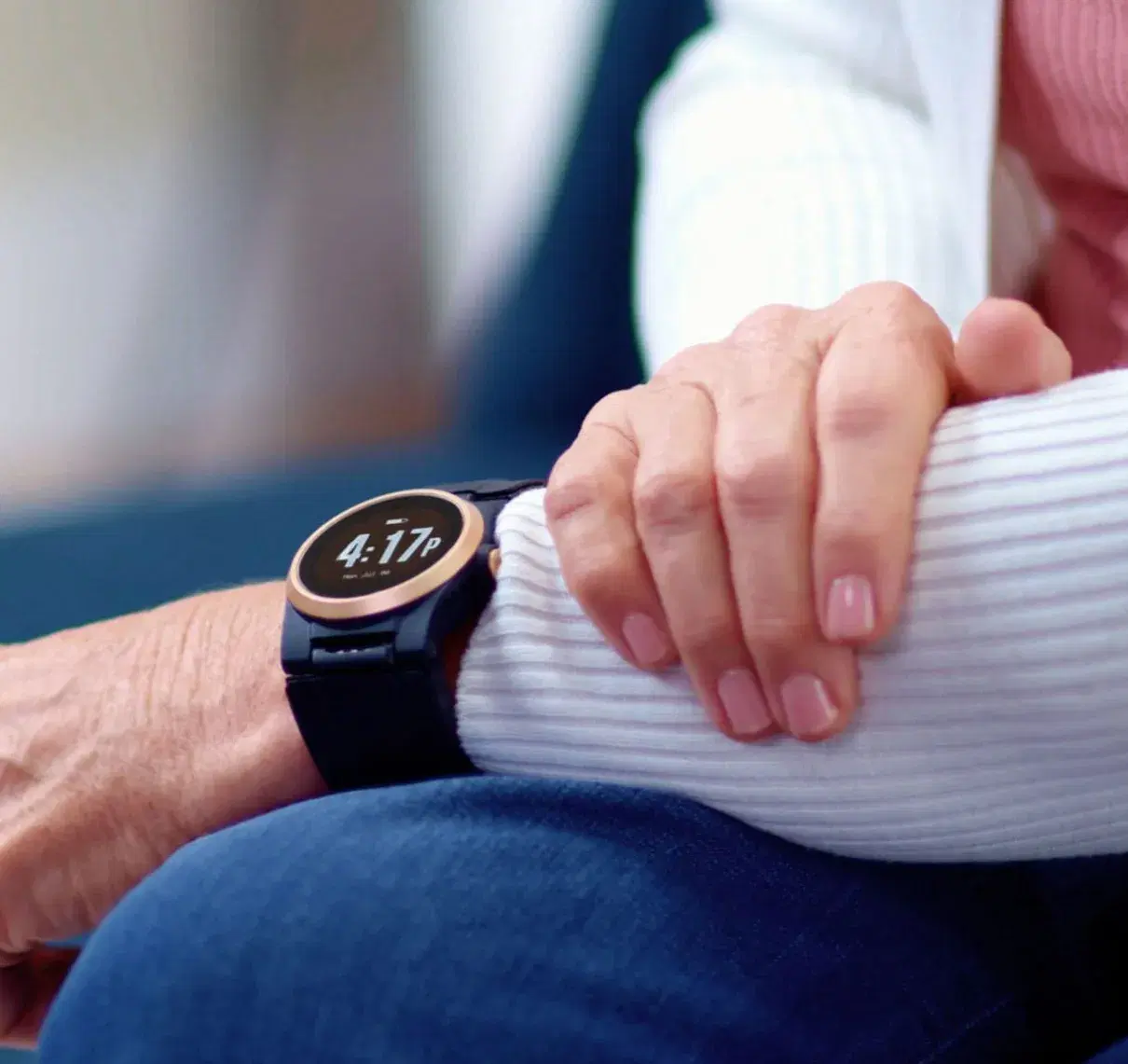 Senior’s wrist wearing the Kanega Watch, resting on their arm