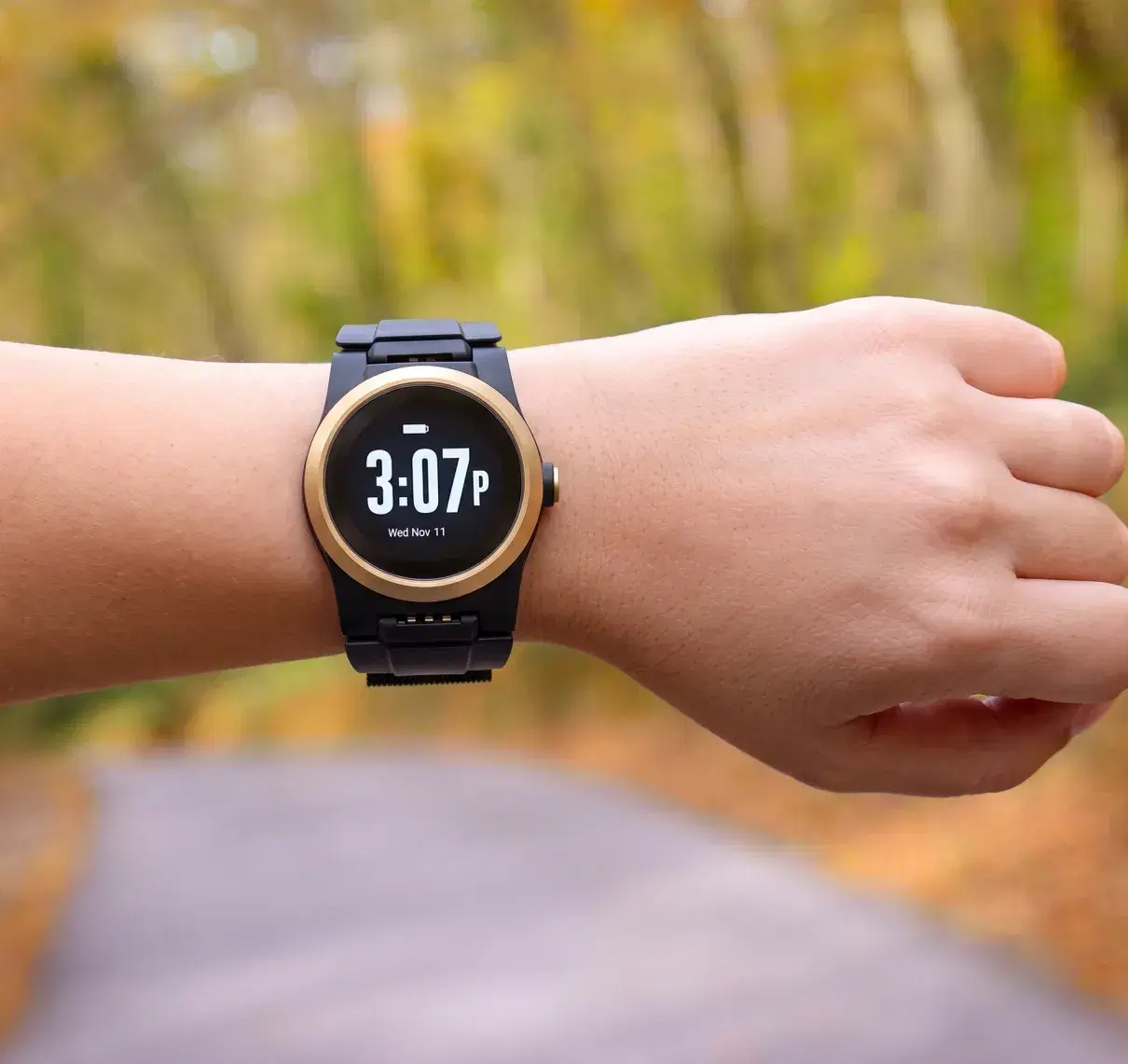 Kanega Watch on an outstretched wrist outdoors